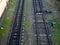 Old railway tracks. View from above. Railway in the moss. Road concept. Train station. Lines