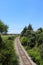 Old railway with trees on the side