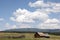 Old Ranch Log Cabin Wooden Fence Cumulus White Clouds