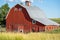 Old red barn in a field in the Palouse region of Washington State