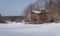 Old Red Barn Ruin in a Snowy Field