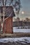 Old red barn in wintry landscape