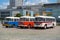 The old red and blue Skoda bus rides through the streets of the Polish capital. Tourist bus vintage model. The street of