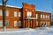 Old red brick building of Museum of Local History and Local Lore, winter cityscape, Senno, Vitebsk region, Belarus