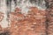 Old red Brick and cement dru Wall Texture background image. Grunge Red Stonewall Background