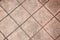 the old red or brown color of cement square floor