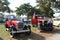 Old red Chevy and Ford parked side by side