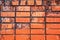 Old red destructed brick wall texture