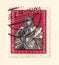 An old red east german stamp with an image of george frederic handel the composer