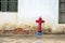 Old red fire hydrant in a stone paved street