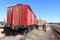 Old red painted wooden train carriages at the Muckleford railway