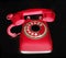 Old red phone ringing of the hook