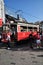 Old red retro tram on Istiklal street in Istanbul. People near the tram