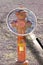 Old red rusty hydrant no longer in use - Concept image seen through a magnifying glass