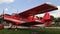 Old red Ukrainian Antonov piston engined biplane