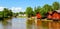 Old red warehouses alongside river Porvoo