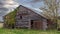 Old red wood barn at twilight