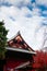 Old red wooden building of Kiyomizu Kannon-do shrine in Ueno park, Tokyo