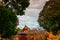 Old red wooden building of Kiyomizu Kannon-do shrine in Ueno park, Tokyo in autumn