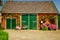 An old refurbished farm barn surrounded by Hydrangeas.