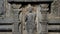 Old Reliefs background image still wet at Prambanan Temple in Indonesia.
