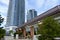 Old restaurant next to modern and tall buildings in Toronto, Canada