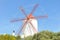 Old restored windmill on spanish balearic island Menorca