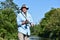 Old Retiree Male Fisherman Smiling With Fishing Rod Outdoors
