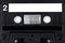 Old retro audiocassette background, analog music tape, topview