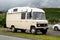 Old retro Mercedes-Benz 508D campervan travelling from Germany to Scottish Highlands near Staffin at Isle of Skye