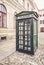 Old retro street public telephone booth