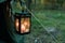 Old Retro Vintage Lantern With Burning Candle Hanging On Camp Tent