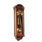 Old retro wall clock with pendulum