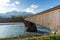 Old Rhine Bridge Alte Rheinbrucke with Appenzell Alps on background - Vaduz, Liechtenstein