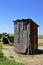 Old rickety rural outhouse