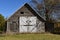 An old rickety storage shed with weathered wood