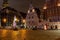 Old Riga the capital of Latvia at night. House of Blackheads in the Town Hall Square and the spire of the Cathedral in the