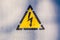 Old risk of electric shock triangle sign