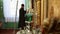 Old rite christian monk praying in a monastery