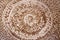 Old roman beige and brown mosaic ceramic circle pattern
