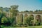 Old roman bridge in Clisson city in the vineyard near Nantes city, Bretagne, France. Italian-style typical architecture, reminisce