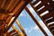 Old roof renovation, frame of the roof against blue sky background