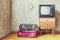 Old room. retro tv and old suitcases