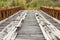 Old rotten abandoned bridge leading to nowhere