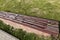 an old rotting wooden bench in the park