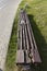 an old rotting wooden bench in the park