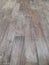 Old rough brown wooden background parquet on living room.