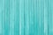 Old rough turquoise wooden planks background.