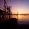 Old Rowing Boaton Sea During Sunset