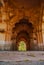 Old ruined arch of Lotus Mahal at sunset, Hampi, Karnataka, India